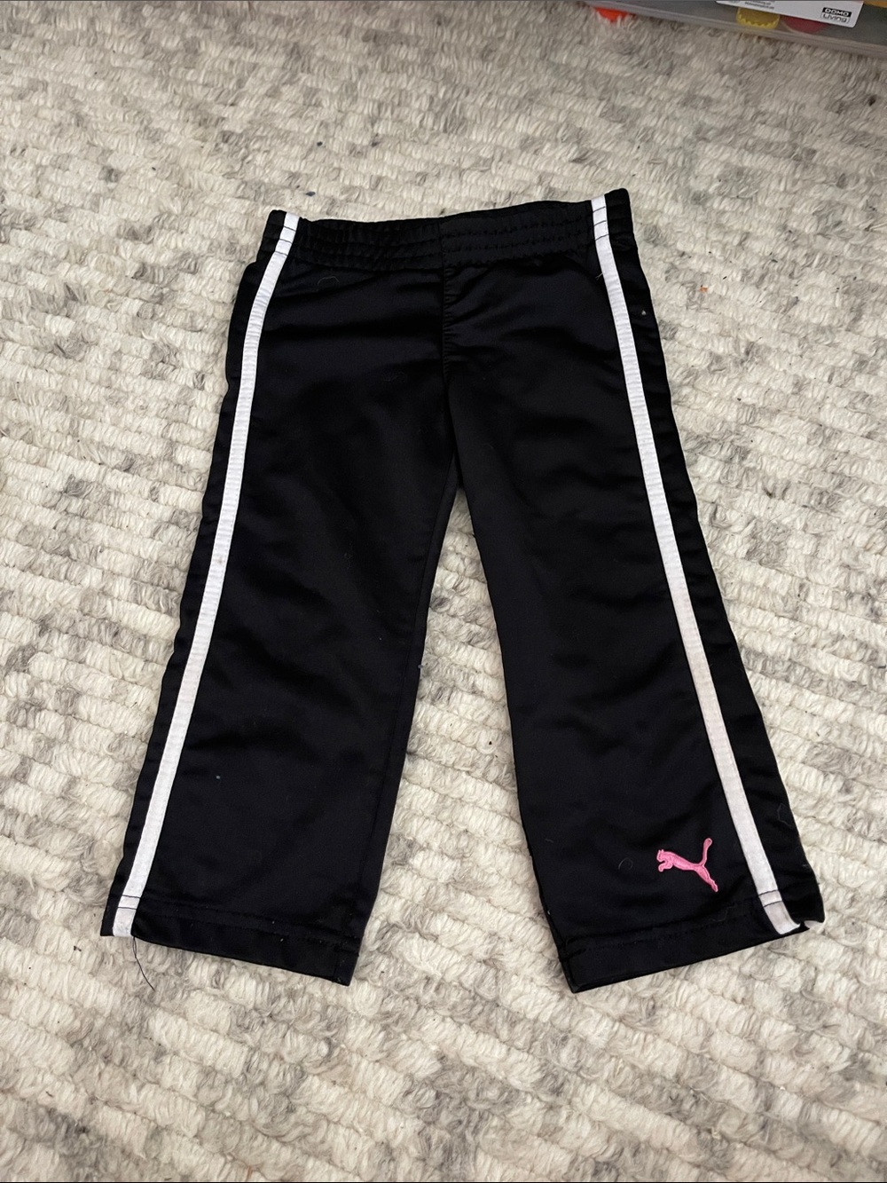 Puma Black Track Pants with White Side Stripes and Pink Logo